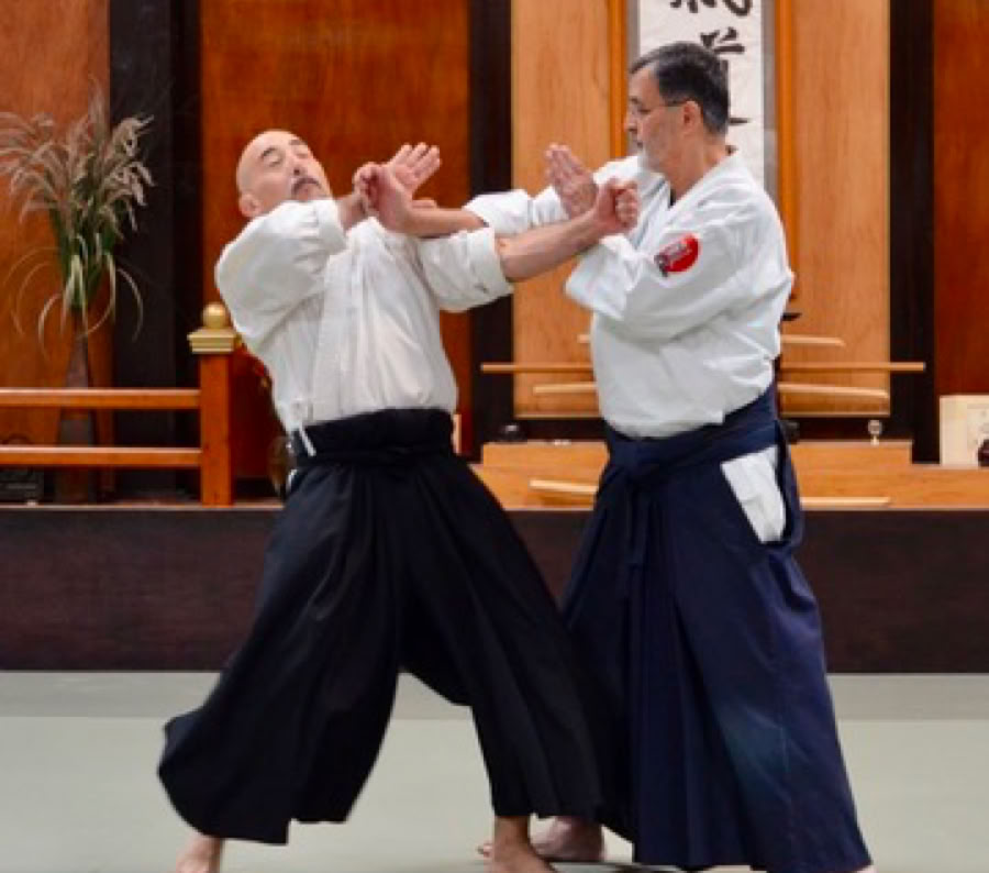 A whiteboard displays a message against bullying. Promote kindness.
